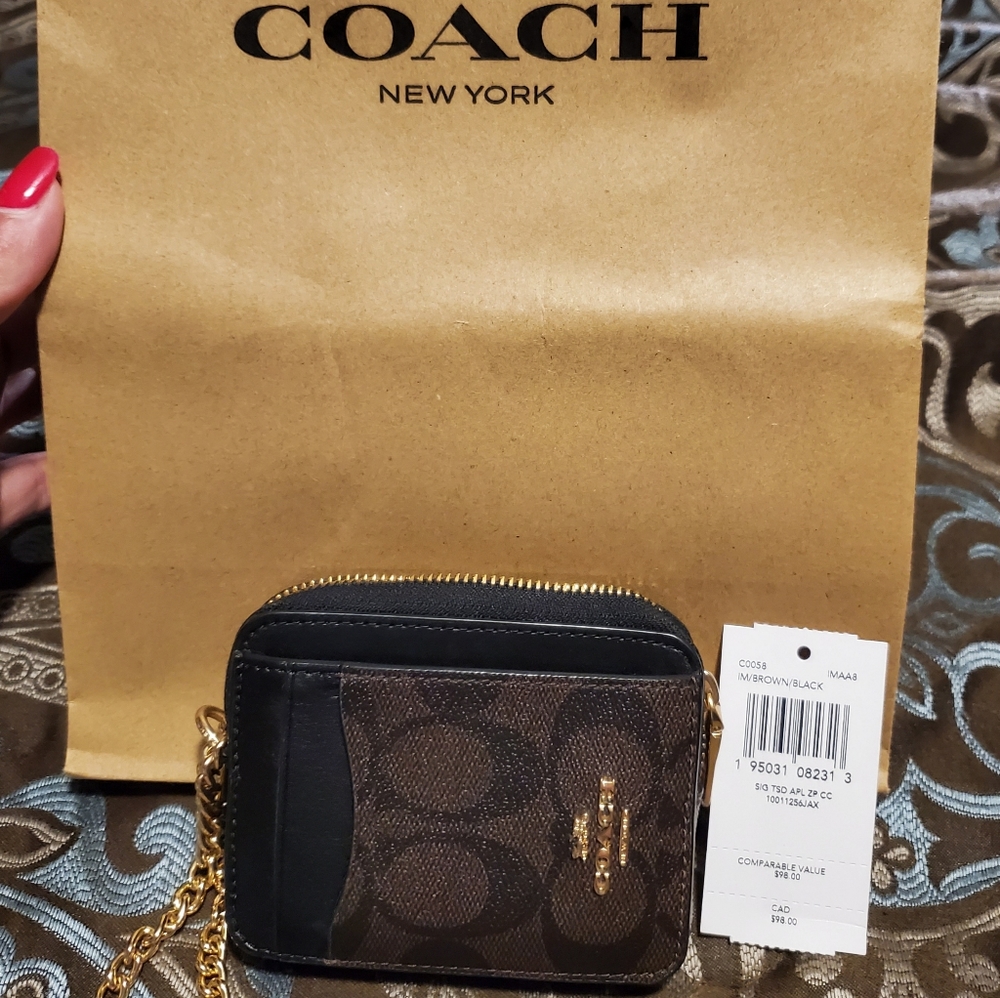 COACH zippered wristlet